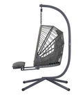 Side view of Outdoor Egg Swing Chair With Stand And Footrest, dark gray metal frame, cushion, for indoor or outdoor use.