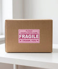 Fragile Handling Sticker Pack 600 Count For Boxes And Warehouse Shipments Red Copper Plate Labels on cardboard box