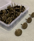Hardcore Upholstery Tacks And Furniture Nails 100 Pack Heavy Duty decorative antique brass tacks in clear container for DIY restorations.