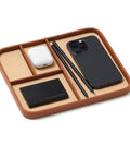 Snap Up This Dope Sand Brown Leather Valet EDC Tray to Sort Your Daily Essentials Watch and Change While Keeping Your Desk or Nightstand Clutter Free and Looking Fresh in Medium Size with phone, AirPods, and cards.