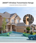 House with Half Mile Solar Powered Wireless Driveway Alarm With Motion Sensor installed, showing 2600ft transmission range.