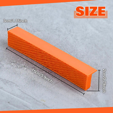 Six Inch Magnetic Vise Jaw Covers With Rock Solid Waffle Grip And Powerful Embedded Magnets For No Slip Clamping on textured orange rubber.