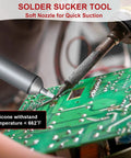 Heavy Duty Desoldering Pump With Strong Suction For PCB Repairs, shown in use on a circuit board with 50mm silicone nozzle.