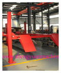 Rock Solid 4 Post Car Lift With Heavy Steel Wire Rope Auto Jack Lifter in a garage with ramps and a sturdy red frame.