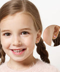 Hypoallergenic Surgical Steel Earrings for Girls and Toddlers with Screw Back Flat Posts Nickel Free and Safe for Sensitive Ears Kid Friendly Mixed 14K Gold and Silver Stud Set Featuring Heart Flower Pearl Star Shapes. Pink heart stud on girl wearing kids earrings