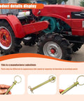 Close-up of a 1/2 x 6-1/4 inch swivel hitch pin for trailer hitches on a red tractor, showing rust-resistant finish and quick pin use.