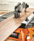 Lightweight Portable Table Saw Dishing Out Snappy Rip And Cross Cuts Without Breaking a Sweat Featuring Smooth Miter Glides And Knockout Stability For Any Job Site cutting wood with precision on a workbench.