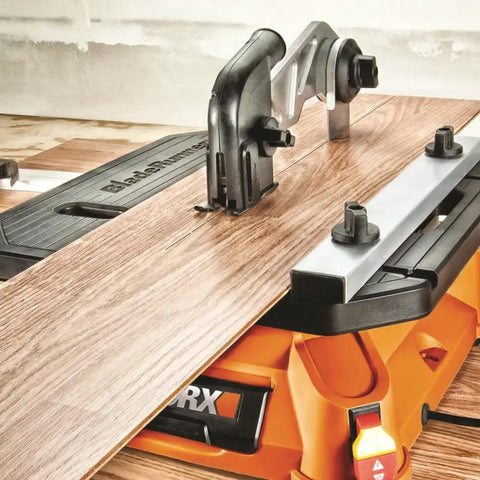 Lightweight Portable Table Saw Dishing Out Snappy Rip And Cross Cuts Without Breaking a Sweat Featuring Smooth Miter Glides And Knockout Stability For Any Job Site cutting wood with precision on a workbench.