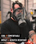 Industrial Grade Full Face Gas Mask With 40mm NATO Filter Compatibility And Advanced Valve Design worn by a person in industrial setting