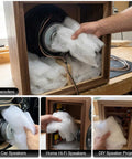 Oversized Heavy Weight Polyester Fiber Speaker Damping Fill Sheet Tough As Nails Acoustic Stuffing For Diy Subwoofer Enclosures being inserted in a subwoofer.