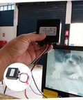 Zero Fluff 24V Heavy Duty Battery Equalizer Voltage Balancer For Nickel And Lithium Ion Packs Pro held in hand, showing connections.