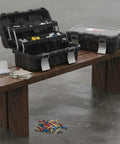 Folding Cantilever Access Organizer Three Tier Tool Chest with industrial grade build in rain on wooden bench