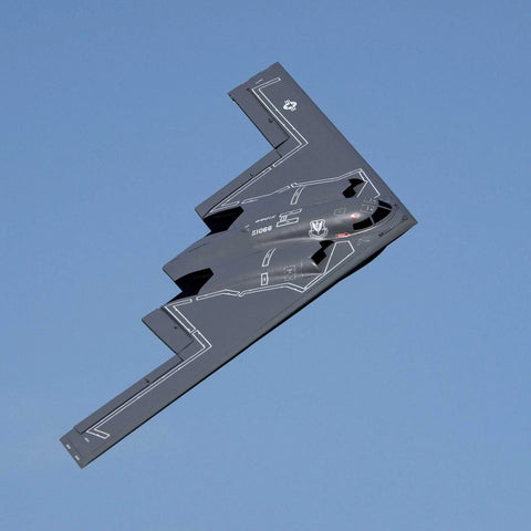 Spirit Of America Twin 30mm EDF RC Warbird Micro Airplane BNF Basic With SAFE Select in mid-flight against a clear sky.