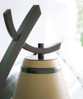 Close-up of Wright 1 Light Table Lamp in Oil Rubbed Bronze Finish, showcasing lamp top, amber shade, home office and living room use.