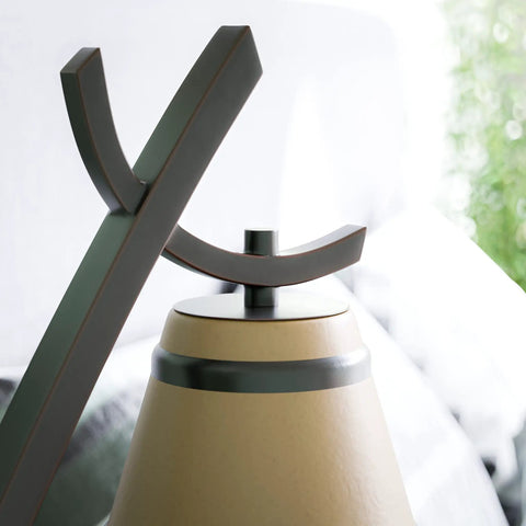 Close-up of Wright 1 Light Table Lamp in Oil Rubbed Bronze Finish, showcasing lamp top, amber shade, home office and living room use.