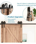 Antique Style Bypass Sliding Barn Door Hardware Kit With Black Top Mounted Tracks and Rollers for Double Doors Installed View