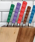 Four Pack Heat Shrink Sleeve For Knife Handles Solid Grip Brown Wrap Soft Polyethylene Tube on knife block, colorful grips visible.