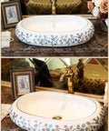 Damn Fine Hand Painted Oval Countertop Washbasin With A Truly Knockout Leaf Pattern Heavy Duty Ceramic Bathroom Sink on marble countertop.