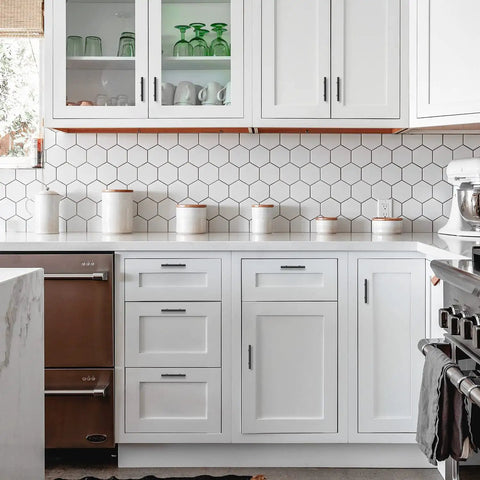 Professional Grade Matte Black Cabinet Pulls For Kitchens And Bathrooms Ultra Smooth Stainless Steel Drawer Handles on white cabinetry.