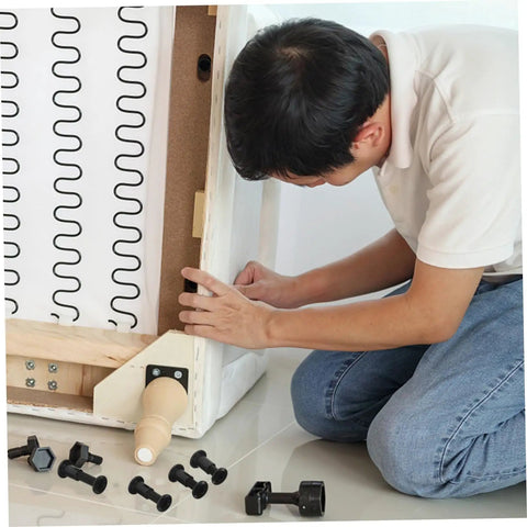 Man assembling furniture with No Sweat Setup Top Shelf Bed Screw And Bolt Set For Furniture Frames Cabinet Joints 170 Piece Heavy Duty Connecting Hardware Kit.
