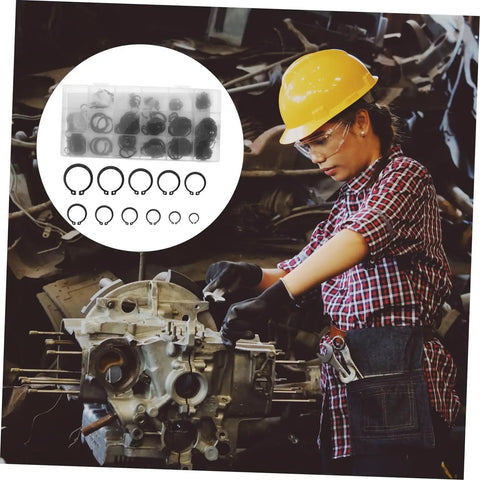 Mechanic using External Circlip Assortment Kit in Carbon Steel with 18 Sizes for automotive repair.