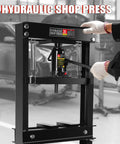 Heavy Duty Hydraulic Shop Press Engineered For Maximum Tonnage And Zero Fuss Operation features a black frame and rapid pump action.