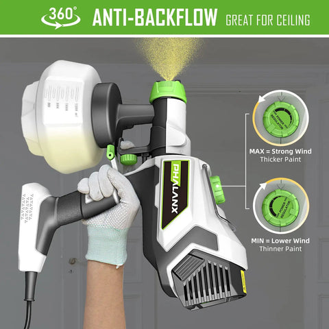 Hand holding Powerful 700W HVLP Paint Sprayer with 1200ml tank spraying on ceiling, anti-backflow feature shown