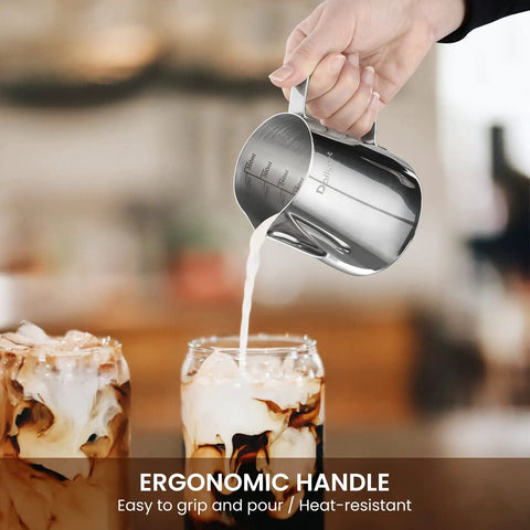 Barista Grade 12oz 350ml Milk Frother Cup With Scale In 304 Stainless Steel being used to pour milk into coffee