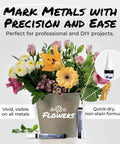 Industrial Metal Marking Paint Pen For Steel And Other Metals next to flower pot with writing showing versatility