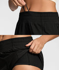 Close-up of Womens 2.5 Inch Quick Dry Gym Shorts with High Waist, showing elastic waistband and built-in liner in black XS