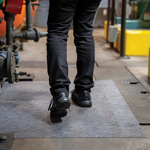 Person stepping on Badass Heavy Duty Commercial Floor Mat Runner With Strong Pressure Sensitive Adhesive Backing For High Traffic Wet Entrances And Ultra Reliable Slip Control Black.