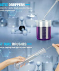 Plastic Graduated Cylinders And Beakers Kit With 5 Pipettes, clear beaker with purple liquid, pipette transferring liquid