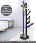 Sturdy Floor Storage Stand With Five Hooks For V Series Cordless Vacuum Cleaners Boss Level Docking Station Organizer in living room.