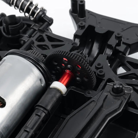Close-up of Steel Spur Gear Set 63T 64T 66T 71T Beefed Up High Speed Gear Set installed in TT02 Series RC Car