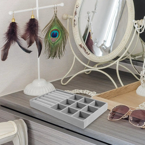 Slick Velvet Jewelry Tray With Anti Scratch Compartments For Rings And Bracelets Includes Dual Grid Foam Inserts on vanity.