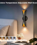 Flynix LED Indoor Wall Sconces, 5 Color Temps Dimmable Hardwired Wall Light mounted beside a bed with soft ambient lighting.