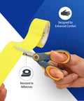 5-Inch Non-Stick Titanium Scissors With Glide Adjust Technology cutting yellow tape, gray and yellow handles visible.