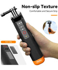 Hand holding Floating Selfie Stick With Bluetooth Remote Waterproof Hand Grip for GoPro, non-slip texture close-up.