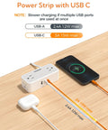 Premium 5 Ft Extension Cord Power Strip With Hella Good 900 Joule Surge Protection Flat Plug Head on wooden desk with USB ports.