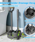 Heavy Hitter Toilet Brush And Plunger Set Featuring Curved Scour Bristles Gray Two Piece Bathroom Clog Knockout Kit With A Rock Solid Freestanding Storage Stand with ventilated holder in bathroom.
