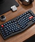 Built Different For Marathon Sessions This 75 Percent Alice Layout Wireless Mechanical Keyboard with hot swappable switches on desk.