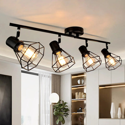 4 Light Track Lighting Fixture In Black Industrial Style With Open Wire Cage, installed in modern living room, E26 Base, bulbs not included