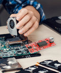 Plug And Play Easydriver Stepper Motor Driver Control Module next to a computer motherboard, showing compact design and CNC plastic build.