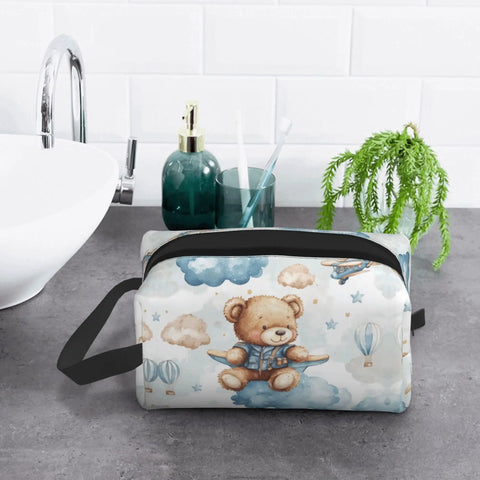 Travel Toiletry Organizer Bag For Women And Men, Waterproof Dopp Kit with teddy bear design on bathroom counter