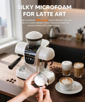 White Semiautomatic Espresso Machine With Built In Grinder And Adjustable Steam Wand 20 Bar Pump For Silky Crema Home Barista Vibes Smooth Daily Grind Fresh Bean Hopper with latte art in focus.