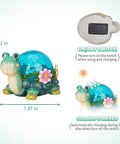Garden Turtle Statue Outdoor Decor Resin Figurine With Glass Solar Lights showing dimensions and solar charging feature
