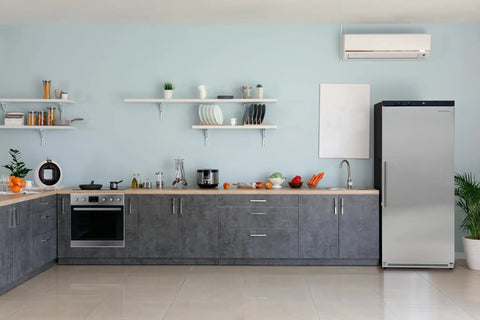 Top Shelf Commercial Workhorse Refrigerator With Heavy Duty Stainless Exterior And No Sweat Temperature Control For Busy Cafes Restaurants And Catering Services in a modern kitchen.