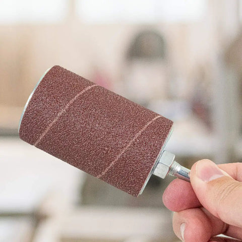 Garage Grade Drill Press Sanding Drum Kit includes a close-up of a sanding drum with quarter inch shank for woodworking tasks.