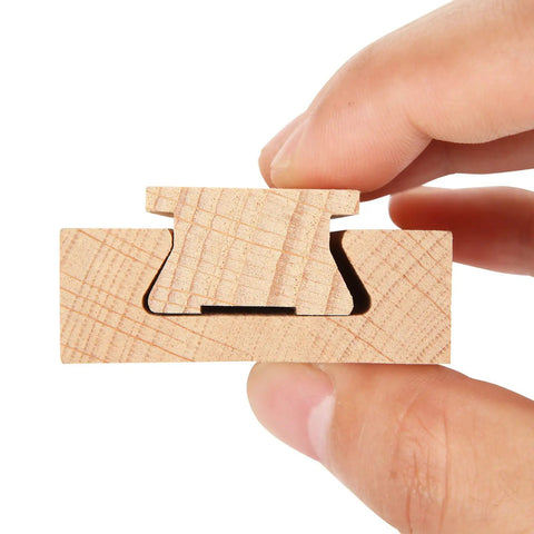 Rock Solid Beech Wood Drawer Slides Center Mount Cabinet Hardware Includes Six Piece Set close-up of drawer slide detail in hand.
