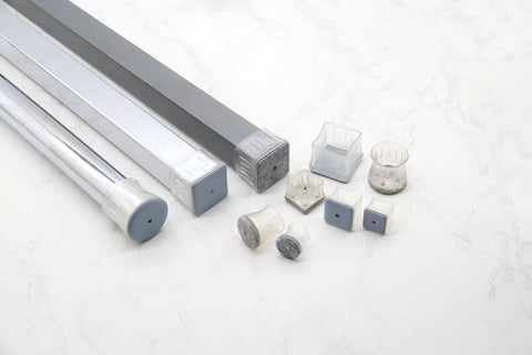 Square Felt Furniture Pads 1 1/4 To 1 3/8 Inch Self Adhesive Floor Protectors 4 Pack on a marble surface.